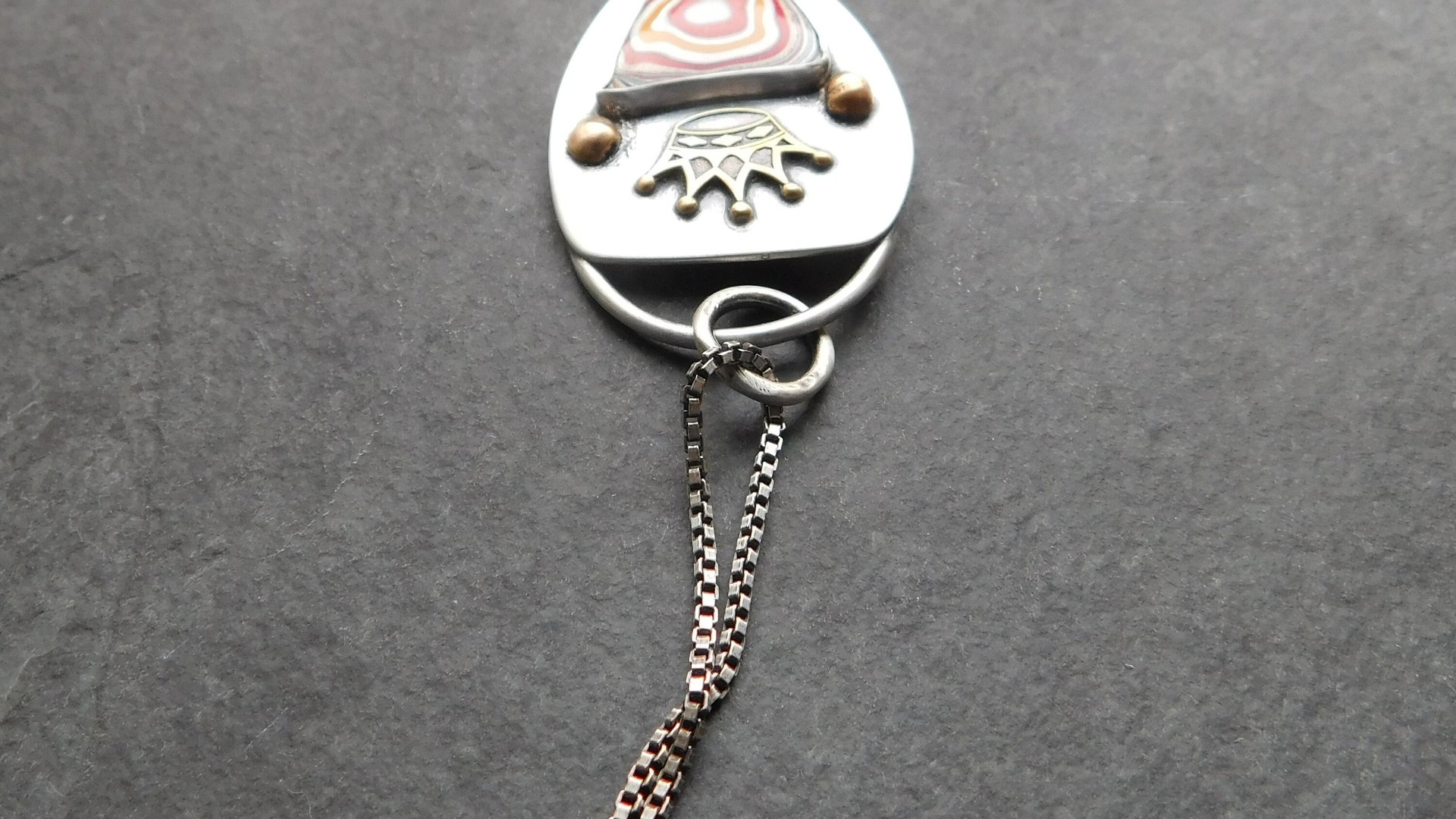 Whimsical Red Yellow Fordite Sterling Silver Bronze Pendant, Mixed Metal Fun Fordite Crown Necklace