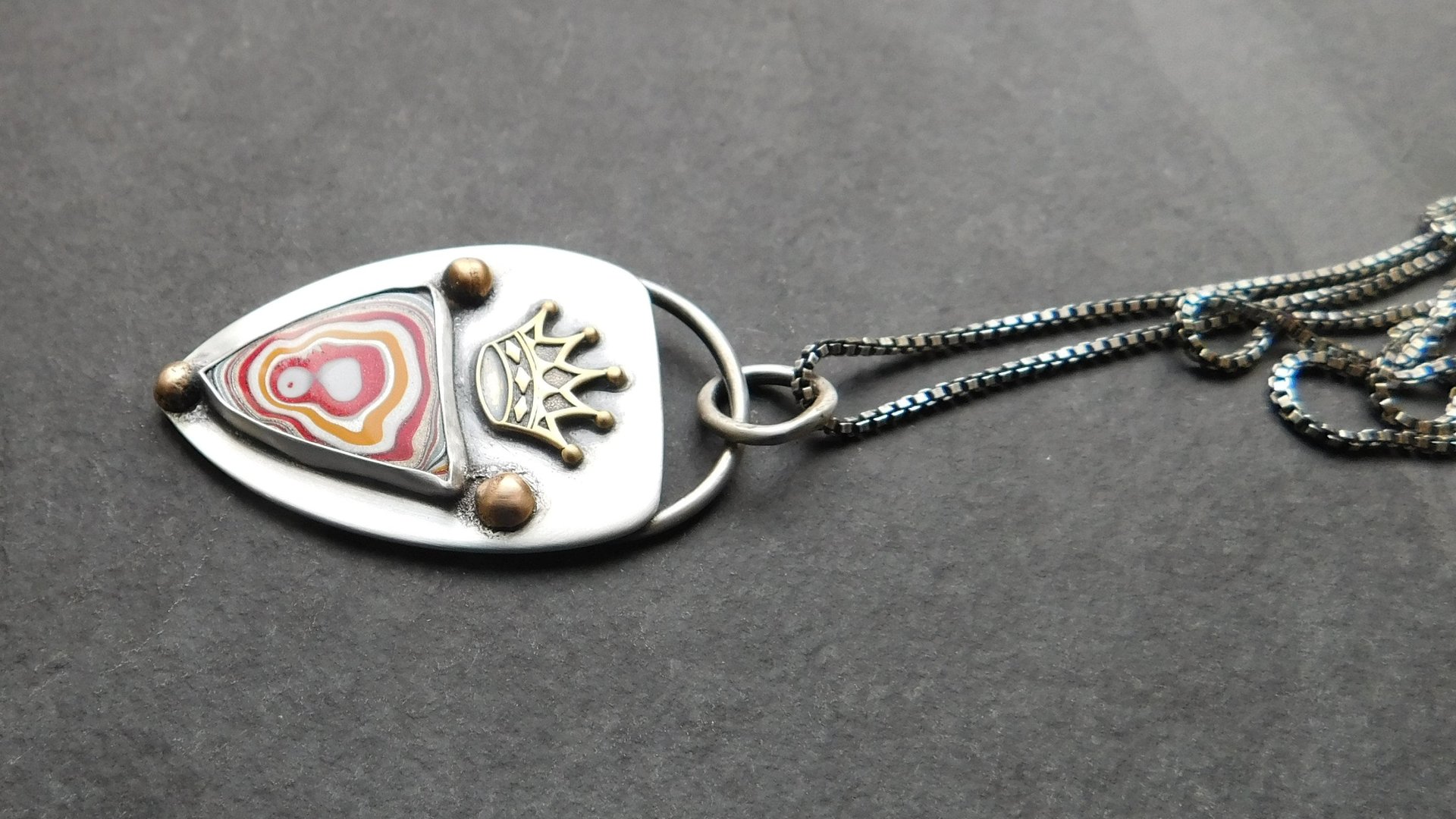 Whimsical Red Yellow Fordite Sterling Silver Bronze Pendant, Mixed Metal Fun Fordite Crown Necklace